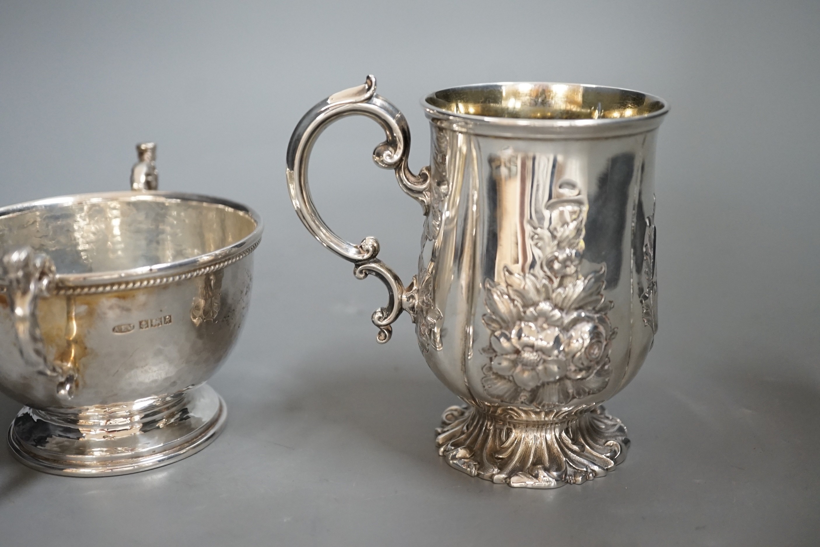 A Victorian embossed silver christening cup, Edward & John Barnard, London, 1848, 11cm and a modern small planished twin handled bowl by A.E. Jones Ltd.